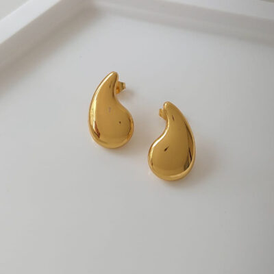 Brinco aço dourado virgula